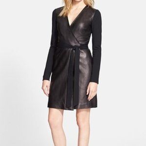 New with tags, Diane Von Furstenberg Black Leather front wrap dress.